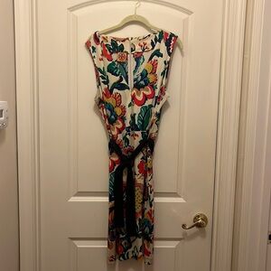 Colorful Tory Burch dress. Very flattering with navy sash. Worn only twice.